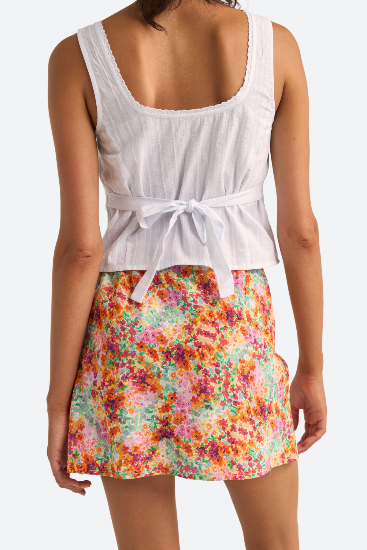 Premium Rhythm Sierra Floral Bias Cut Mini Skirt in Orange - Effortless Chic Style